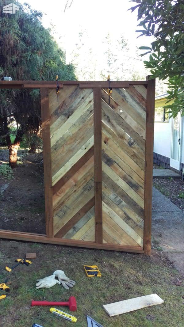 Backyard Fence Made with Repurposed Pallets Pallet Fences Backyard Fence Made with Repurposed Pallets Pallet Fences