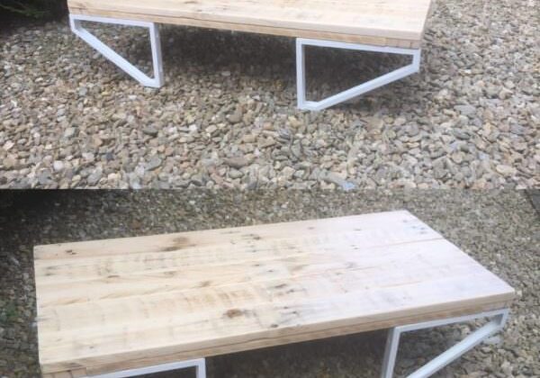 Combine store-bought table legs or brackets to create a modern feel on a shoestring budget. This table would be gorgeous in your living room or in your outdoor living spaces! An excellent DIY Pallet Project for sure!