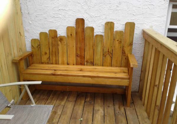 This bench has a straight back rest.