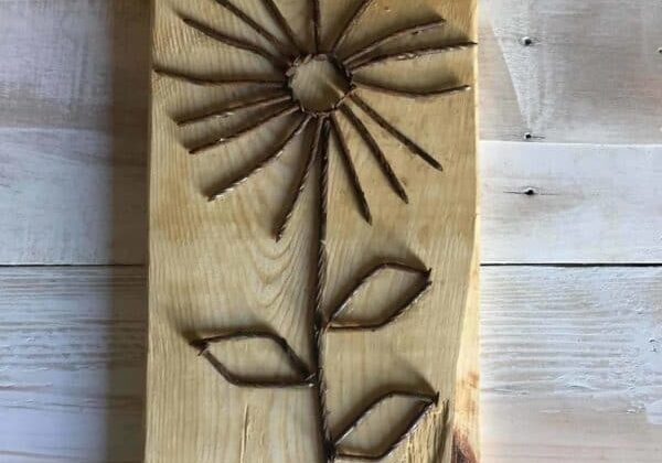 1001pallets.com-cute-recycled-pallet-nail-wall-art-01-e1494241148489-600x787
