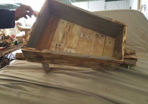 1001pallets.com-one-pallet-wheel-barrel-planter